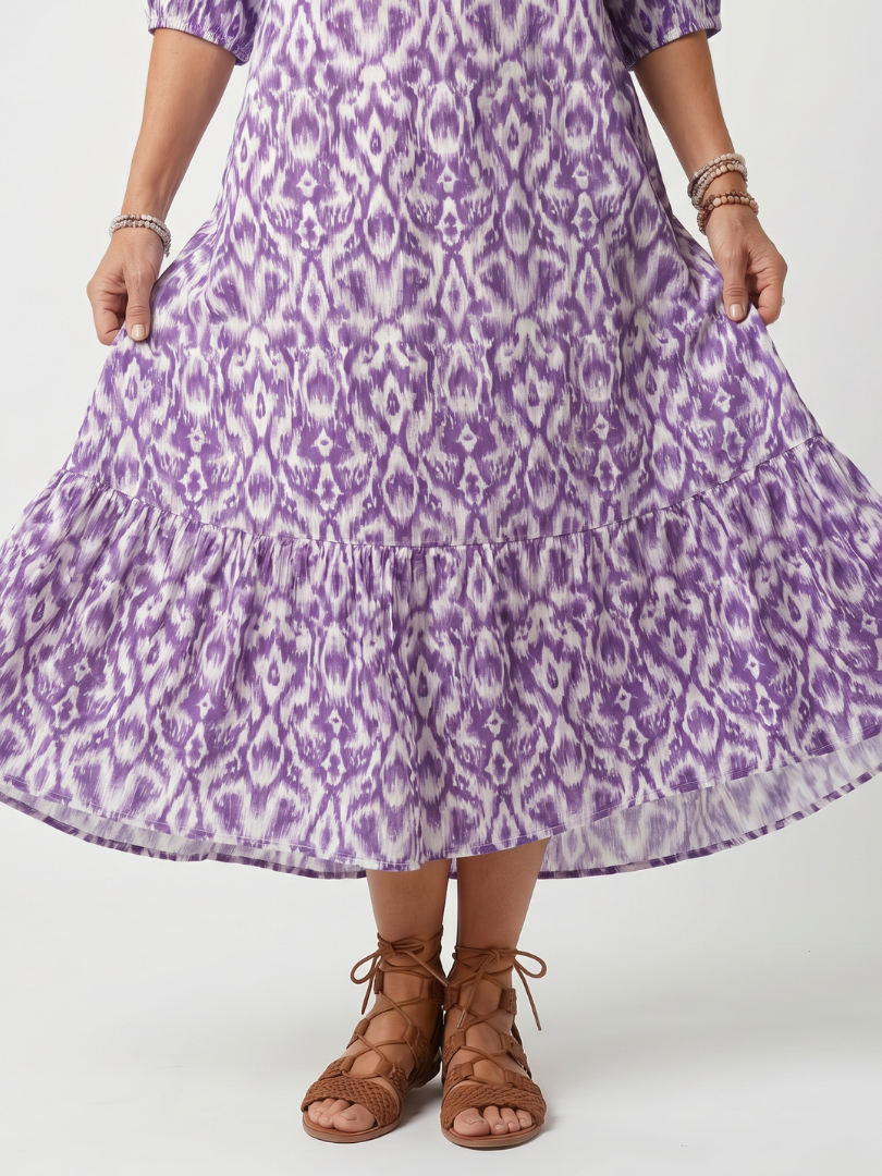 Penelope | Robe midi femme imprimée, col noué à pompons
