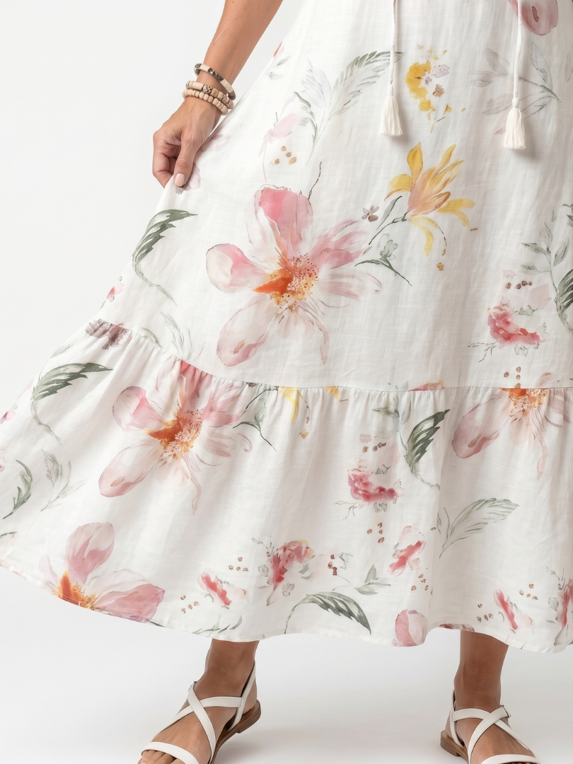 Noa | Robe midi femme à volants, imprimé floral doux et pompons