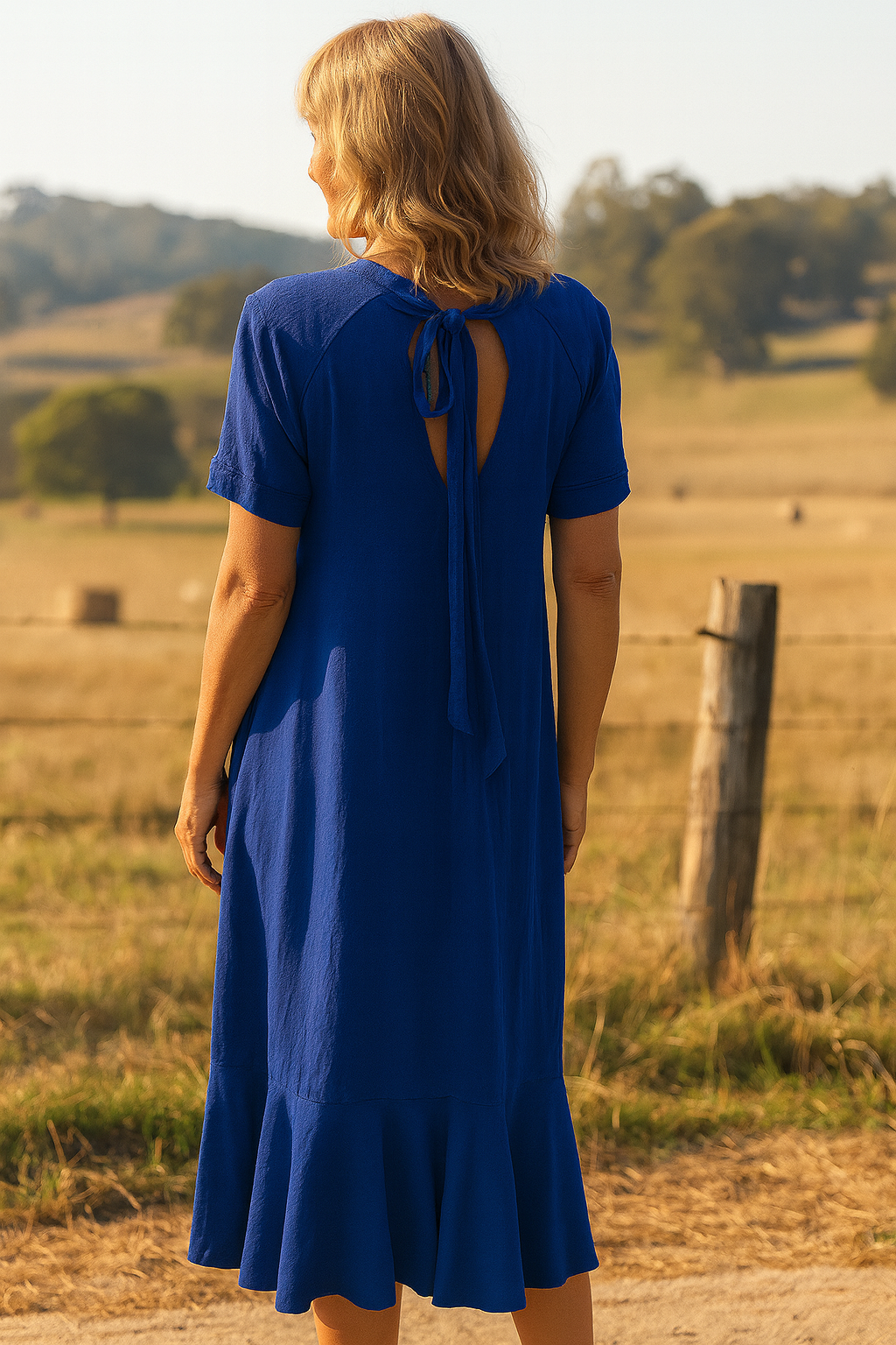 Solange | Robe midi femme fluide en polyester, à poches et volants pour journées chaudes