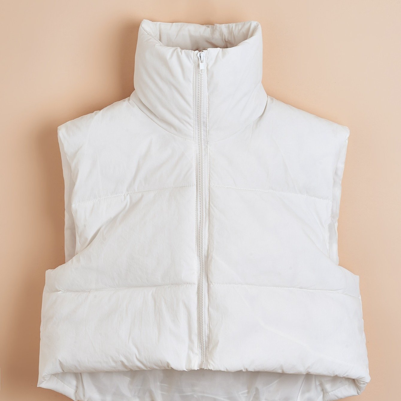 Tova | Gilet thermique femme zippé à col haut, léger et chaud